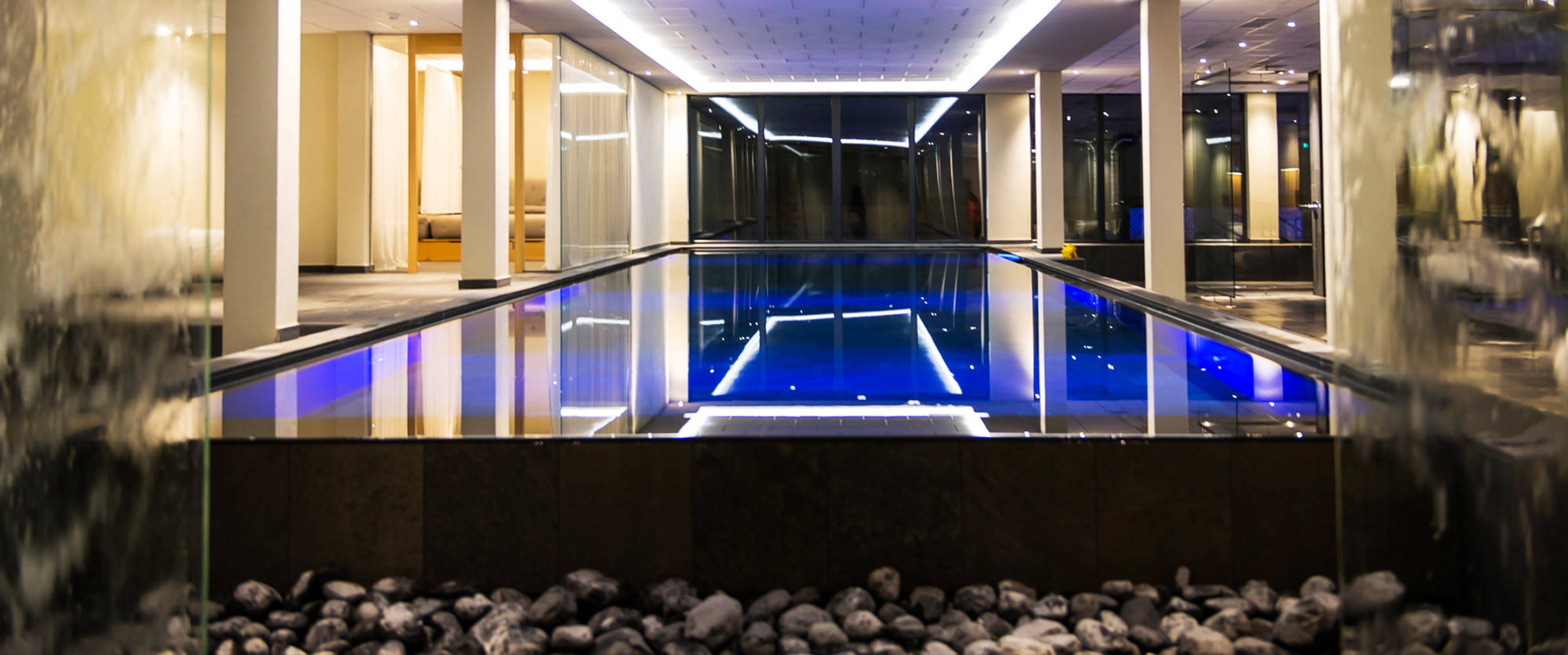 Hotel swimming pool Indoor pool illuminated blue