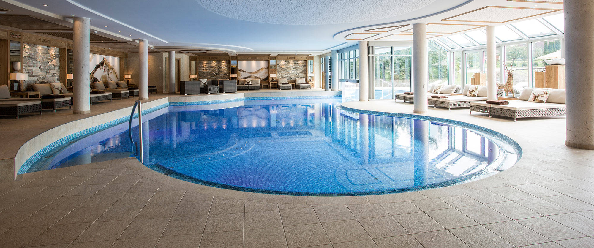 Hotel swimming pool Indoor pool with harmonious interior design