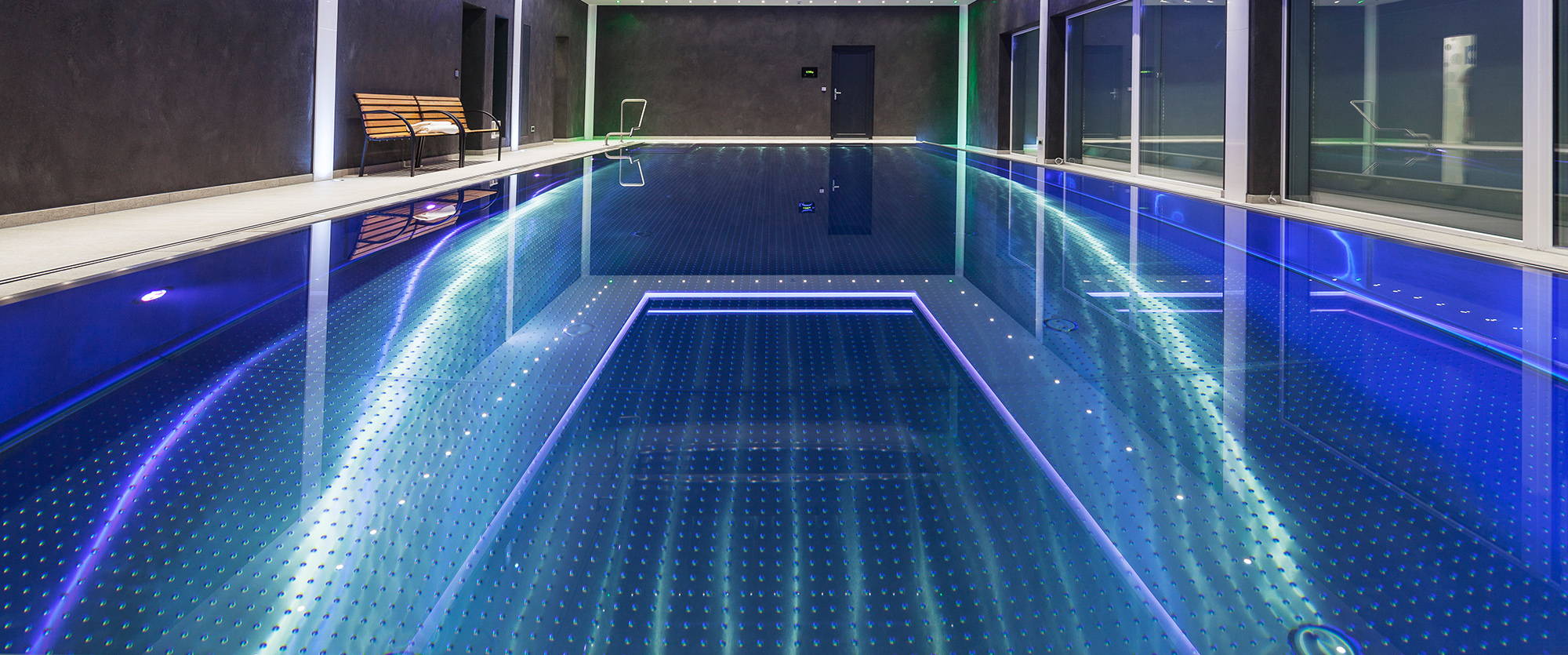 High end indoor pool illuminated front view