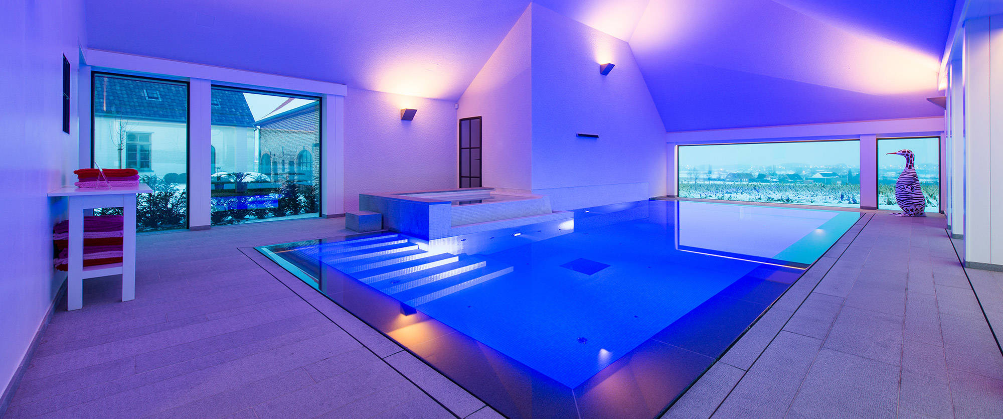 Indoor pool General view atmospherically illuminated blue